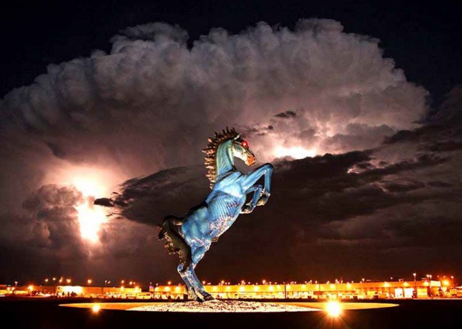 The Blue Mustang illuminated by Denver International Airport's lights.